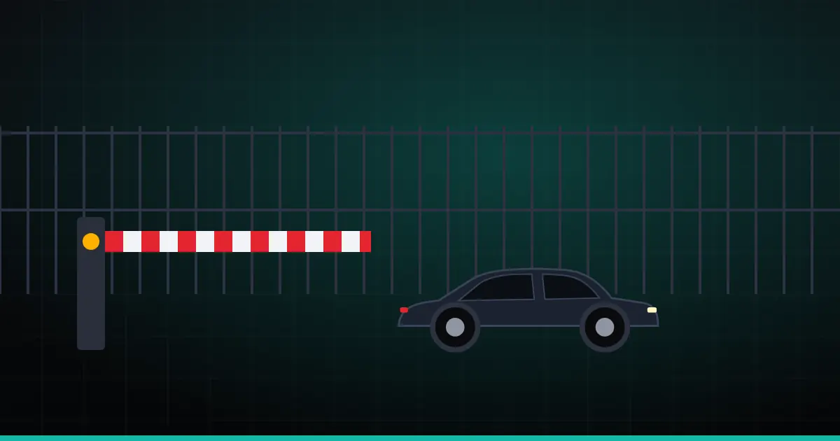 Illustration d'une barrière de fourrière rouge et blanche devant une voiture stationnée